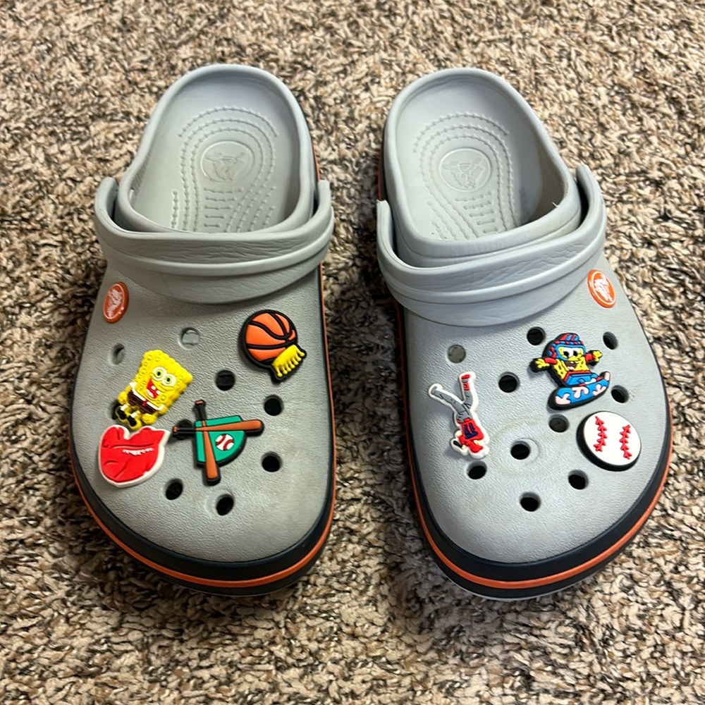 Boys Crocs Size 6 with charms